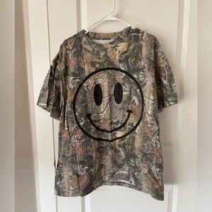 Dressed in Lala The World Needs Your Magic Camo Tee in Black